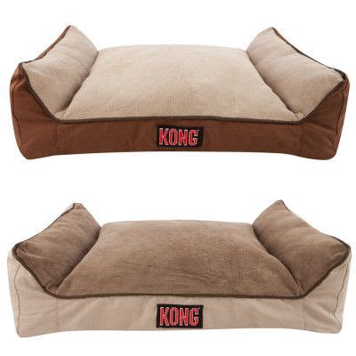 two dog beds with the word kong written on them and one has a brown pillow