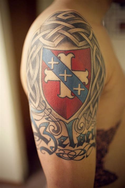 My brother's tattoo. Our family crest and I picked out the font. | Coat of arms tattoo, Coat of ...