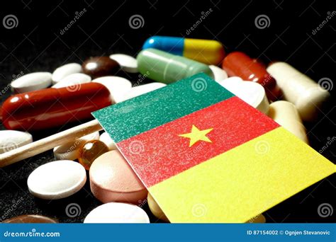 Cameroonian Flag With Lot Of Medical Pills Isolated On Black Background Stock Photo - Image of ...