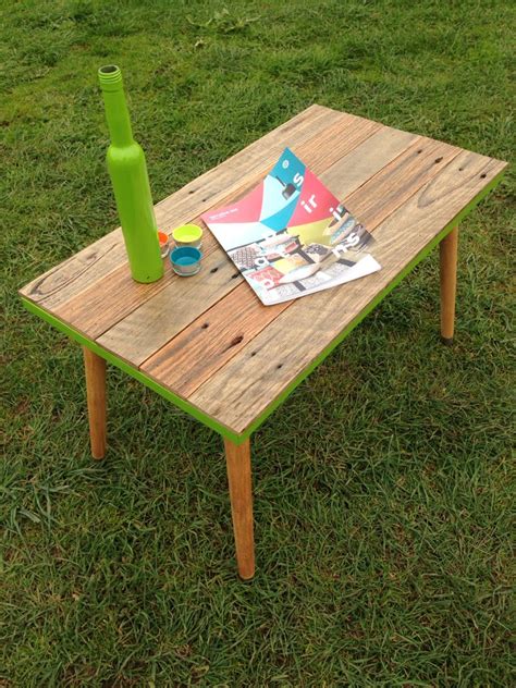 Upcycled mid century coffee table with reclaimed hardwood top and lime accent. More furniture a ...