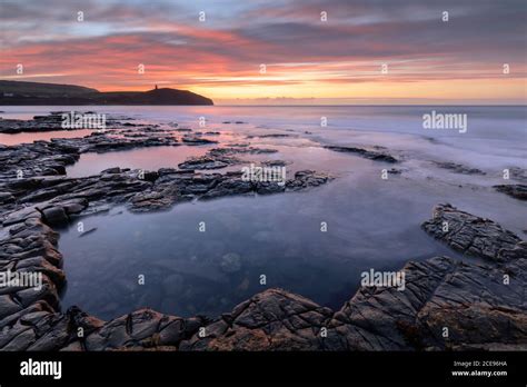 Winter sunrise at Kimmeridge Bay Stock Photo - Alamy