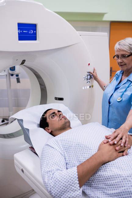 Patient entering mri machine at hospital — standing, prognosis - Stock Photo | #227243948