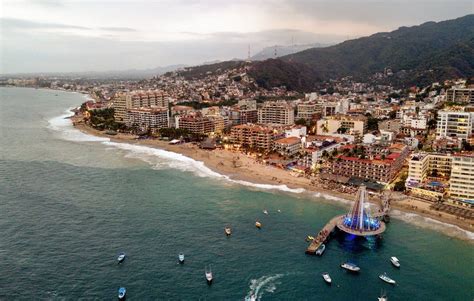 An Areal View Of El Malecon Boardwalk, Los Muertos Pier And City Of Puerto Vallarta, Mexico ...