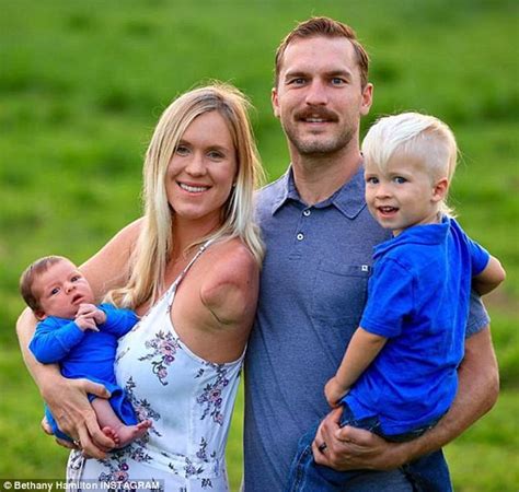 Shark attack victim turned pro surfer Bethany Hamilton welcomes child | Daily Mail Online