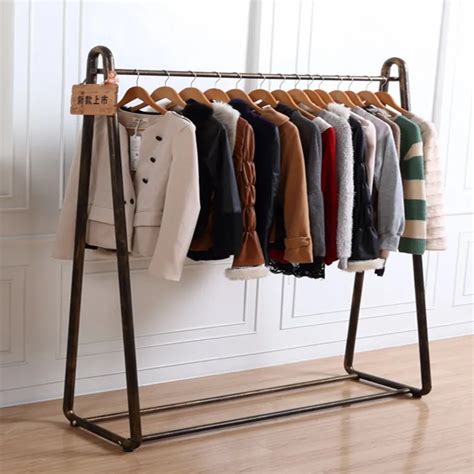 Cheap Iron horizontal bar floor clothes hangers display rack clothing ...