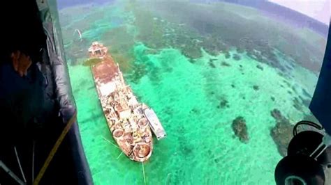 Dropping supplies to rusting Philippine ship, Sierra Madre - BBC News