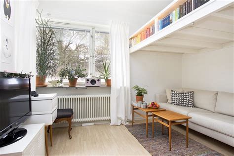 Small Swedish Studio Apartment Elegantly Combines Loft Bed and Book Shelves - Living in a shoebox