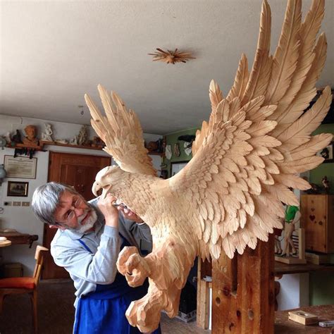 Intricately Carved Wooden Animal Sculptures Leap to Life