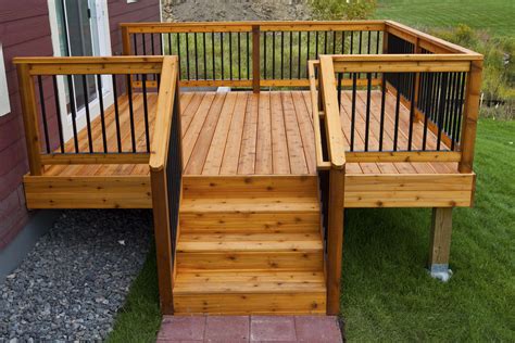 Simple, relatively inexpensive cedar deck with aluminum hybrid rails. Built by Deck And Basement ...