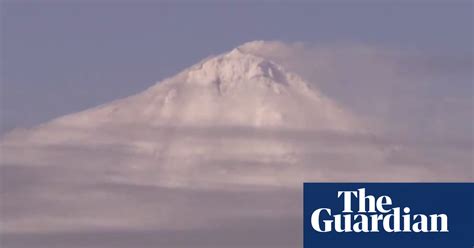 Research vessel in Antarctica captures rare footage of volcano erupting – video | World news ...