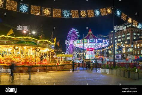 George Square, Glasgow, with the Chrismas lights, fair and City Chambers in the background ...