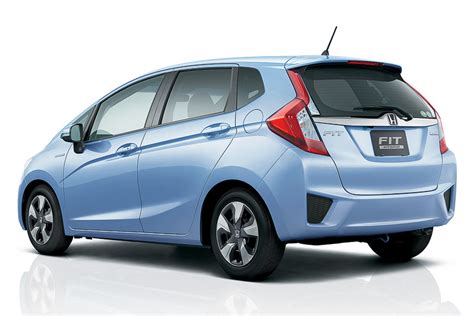 2016 Honda Fit (Honda Jazz) rear three quarter light blue unveiled in Japan