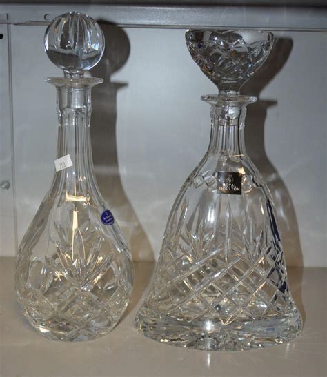 Sold at Auction: Two Royal Doulton crystal decanters