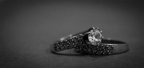 Grayscale Photo of 2 Silver With Diamond Rings · Free Stock Photo