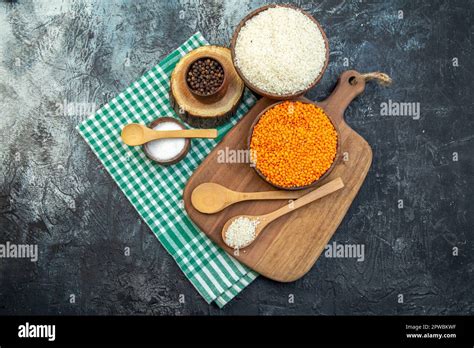 top view raw rice with orange lentils on dark background food seed cereal meal groats soup color ...