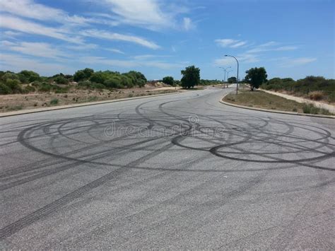 Tyre Tire Skid Marks on Bitumen Road Stock Photo - Image of doughnut ...