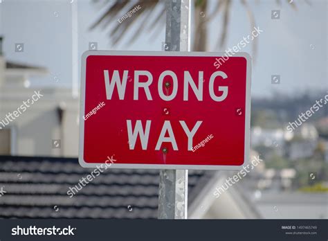 Wrong Way Road Sign Blurred Background Stock Photo 1497465749 ...