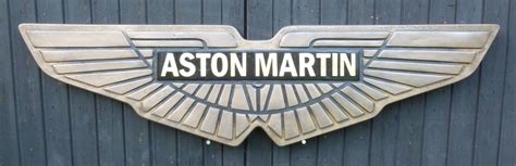 Bonhams Cars : An 'Aston Martin' garage display emblem,