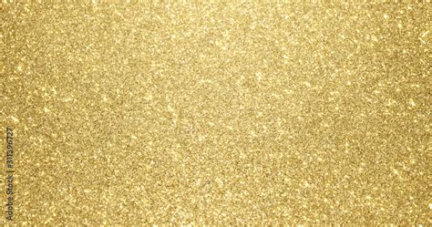 Gold glitter background with sparkling texture. Golden shimmering light ...