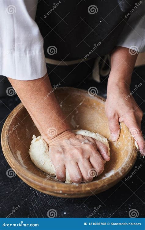 Baker hands kneading dough stock photo. Image of fresh - 121056708