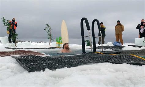 Antarctic-based Aussies take icy plunge to mark winter solstice ...