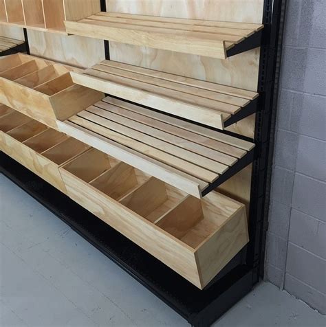 wood slat shelving bakery display | Slatted shelves, Bakery display, Retail shelving