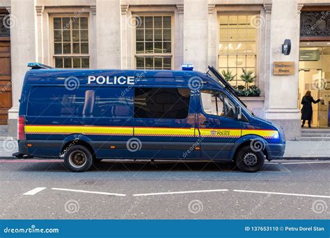 A Blue Police Car in City of London,Uk Editorial Image - Image of emergency, londonuk: 137653110