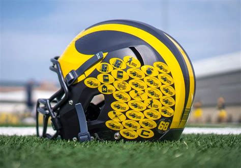 Michigan football debuts new helmet stickers telling a player’s story ...