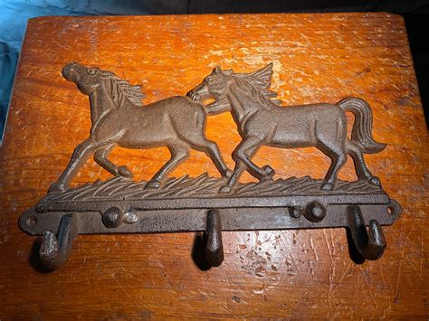 Vintage Cast Iron Horse Hooks