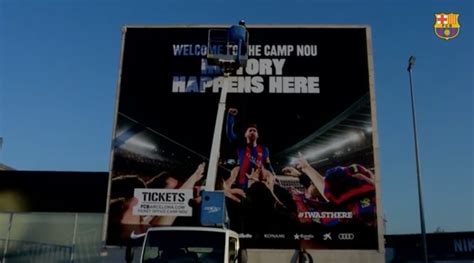 Messi's most famous photo adorns Camp Nou entrance