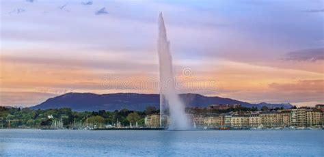 The Geneva Water Fountain in Geneva, Switzerland. Sunset. Stock Photo ...