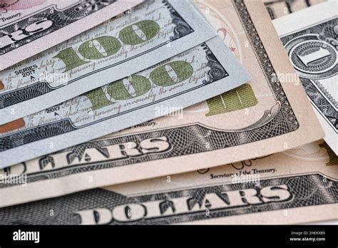 American dollar bills in a pile. Close up Stock Photo - Alamy