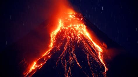 Philippine volcano spews lava fountains, 56,000 people flee