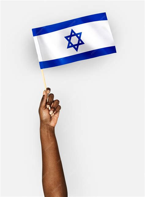 Free Photo | Person waving the flag of state of israel