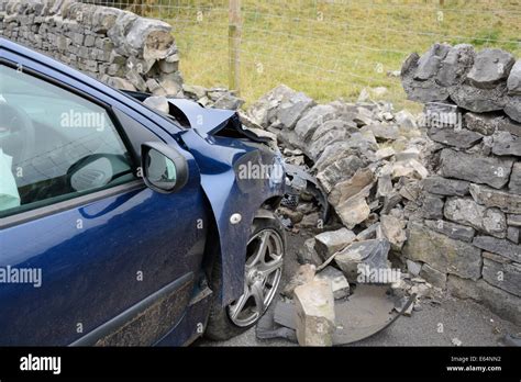 Car crash into wall Stock Photo - Alamy