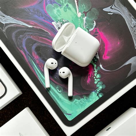 Airpods 2nd Gen with wireless charging, Audio, Headphones & Headsets on Carousell