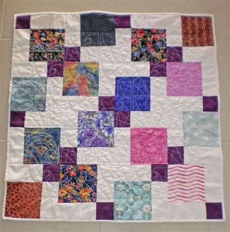 Disappearing nine patch scrappy patchwork quilt, made with left over ...