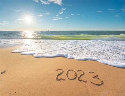 Premium Photo | 2023 year on the sea shore at day