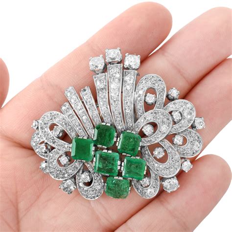 Art Deco Diamond and Emerald Brooch | Kodner Auctions