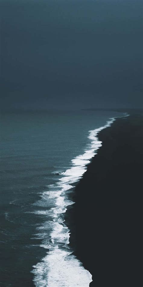 Download Mysterious Dark Ocean Waves Wallpaper | Wallpapers.com