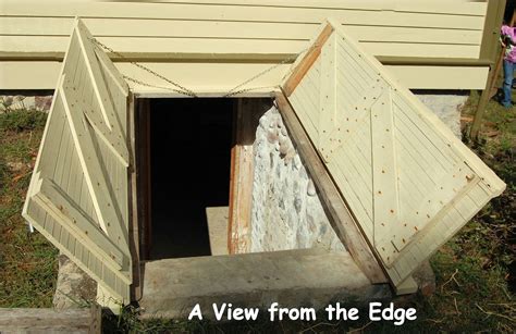 an old outhouse with the door open