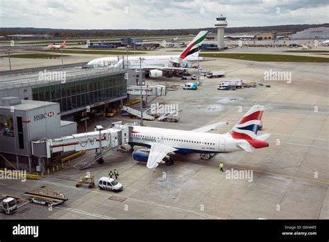 London Gatwick Airport with passenger jets on the jetway Stock Photo ...