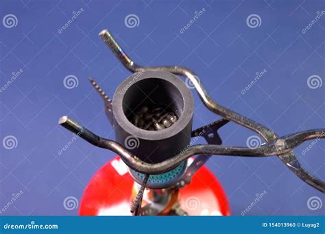 Lead melting, molten lead stock photo. Image of holding - 154013960