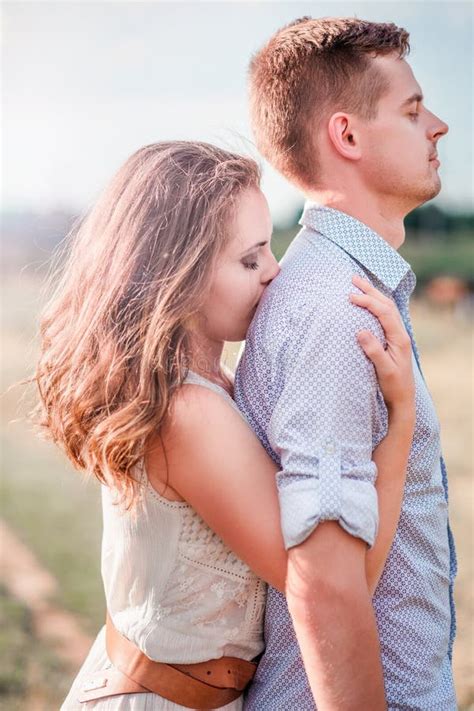 Stylish Adult Guy and Girl Hugging. Vertical Photo Stock Photo - Image of girl, beautiful: 142368950