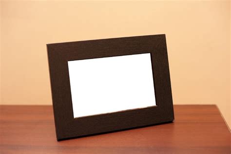 Free Image of Blank table top wooden picture frame | Freebie.Photography