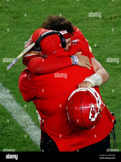 Kansas City Chiefs quarterback Patrick Mahomes (15) hugs head coach Andy Reid against the San ...