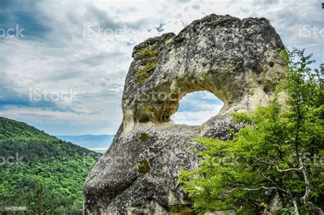 Osmars Eye Rock Formation In Bulgaria Stock Photo - Download Image Now ...