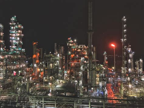 An oil refinery on a gloomy night : r/evilbuildings