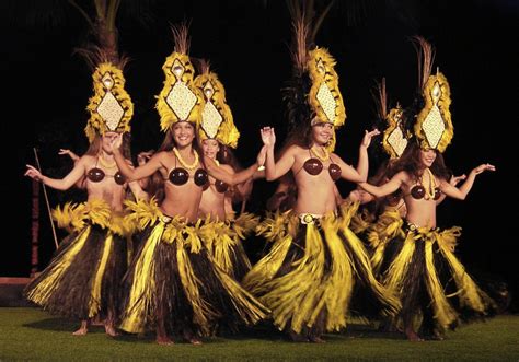 Tourism - Hula Dancers These dancers wear huge headpieces along with coconut bras, which has ...