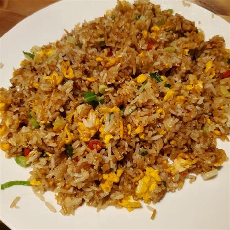 I made Uncle Roger's egg fried rice (with white pepper and bird's eye ...